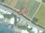 伊良部ホテルが並ぶ通り沿い　290坪　原野